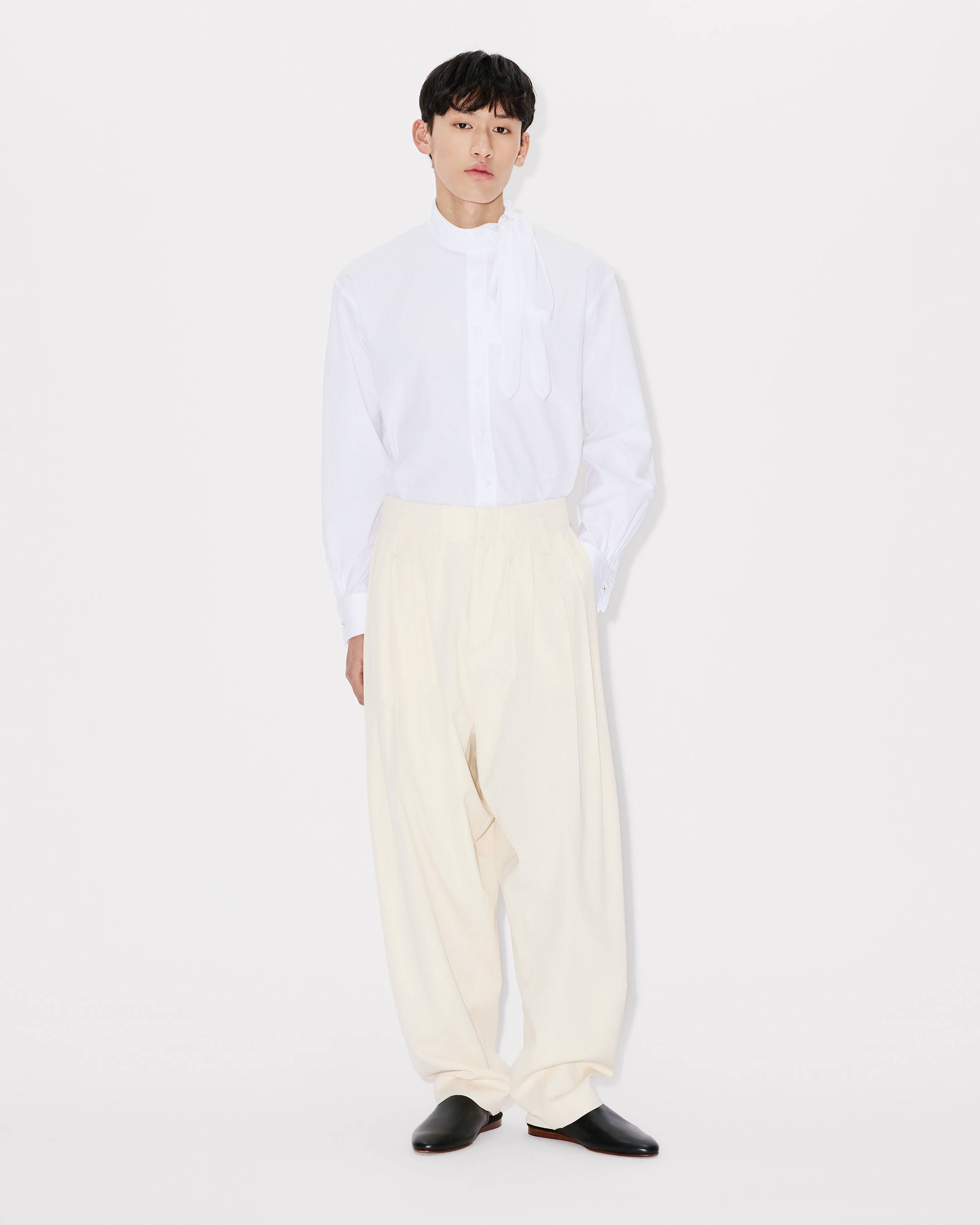 Pleated pants in virgin wool