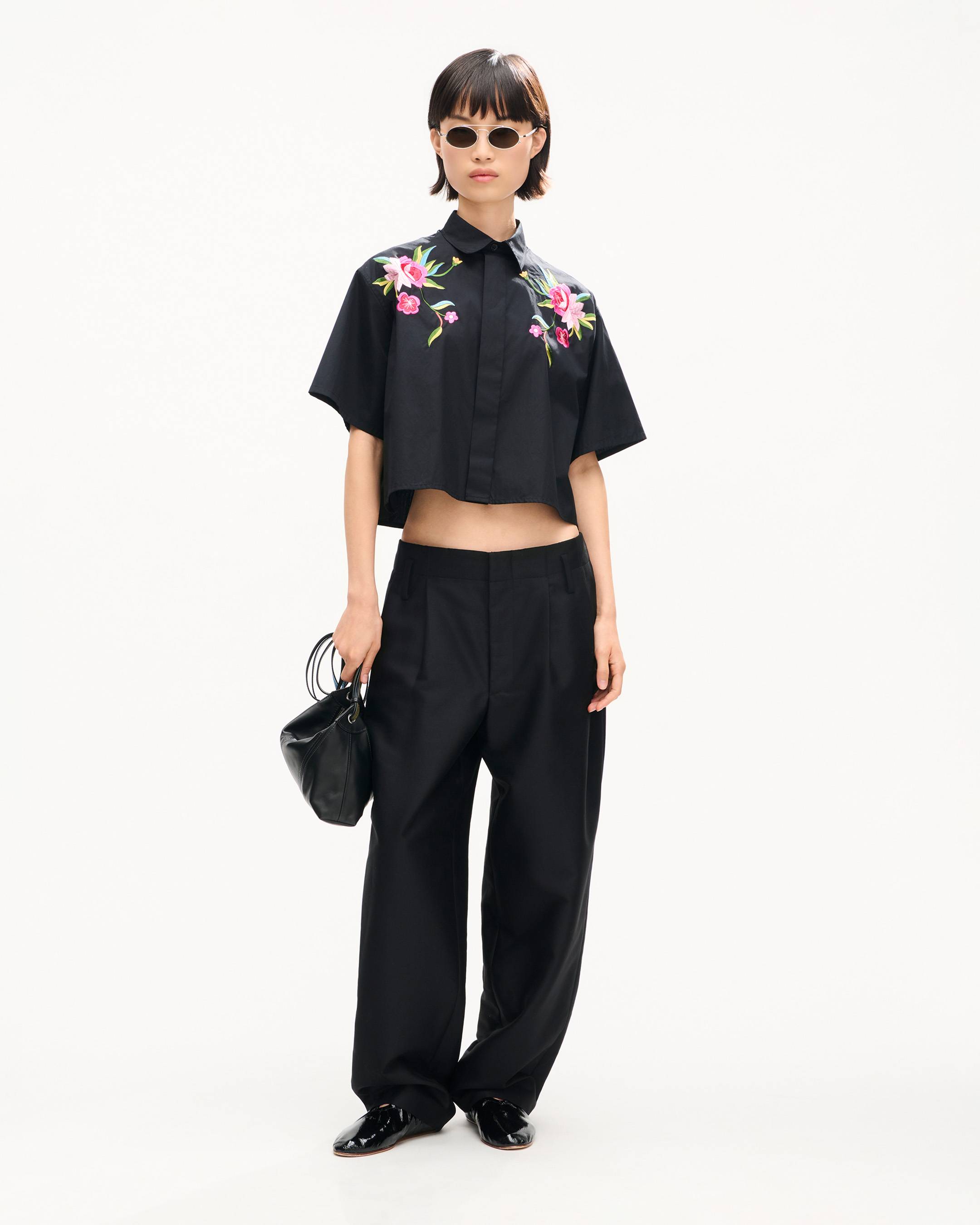 Tailored pleated loose pants in wool and silk