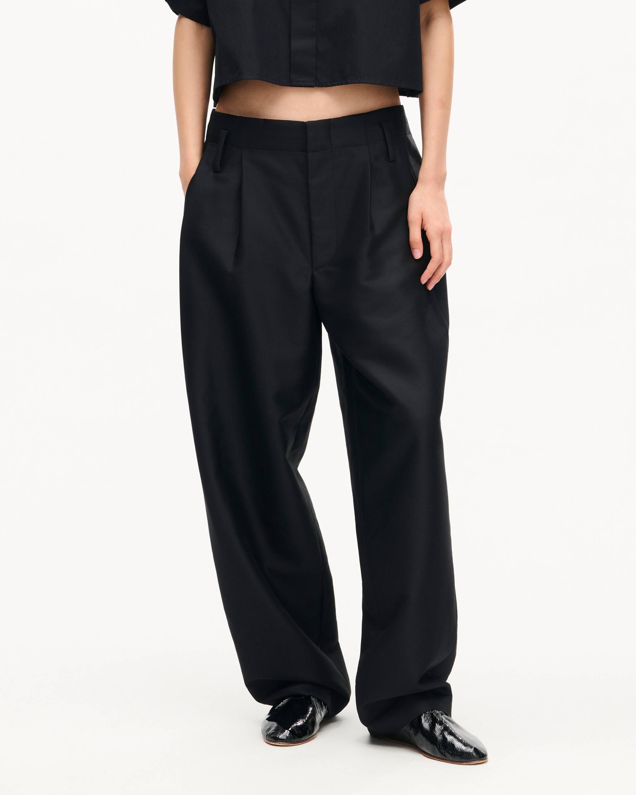 Tailored pleated loose pants in wool and silk