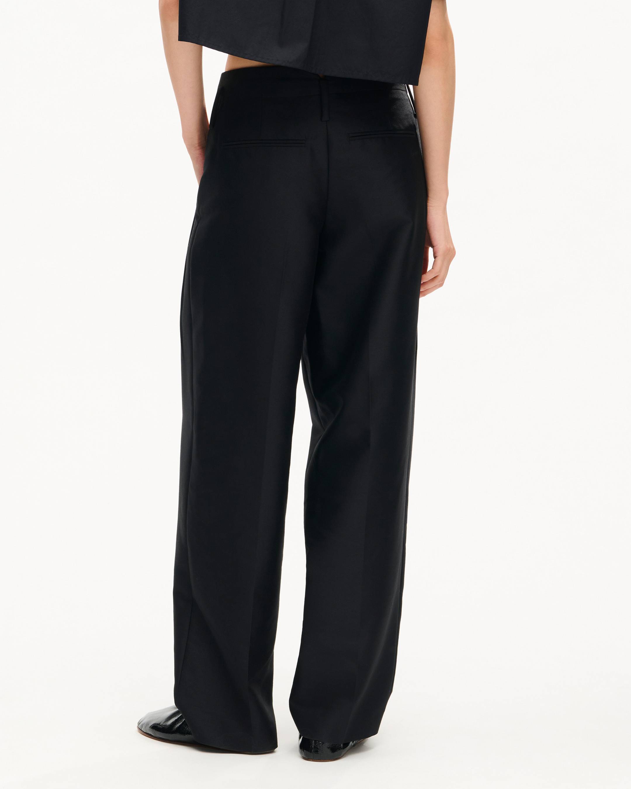 Tailored pleated loose pants in wool and silk
