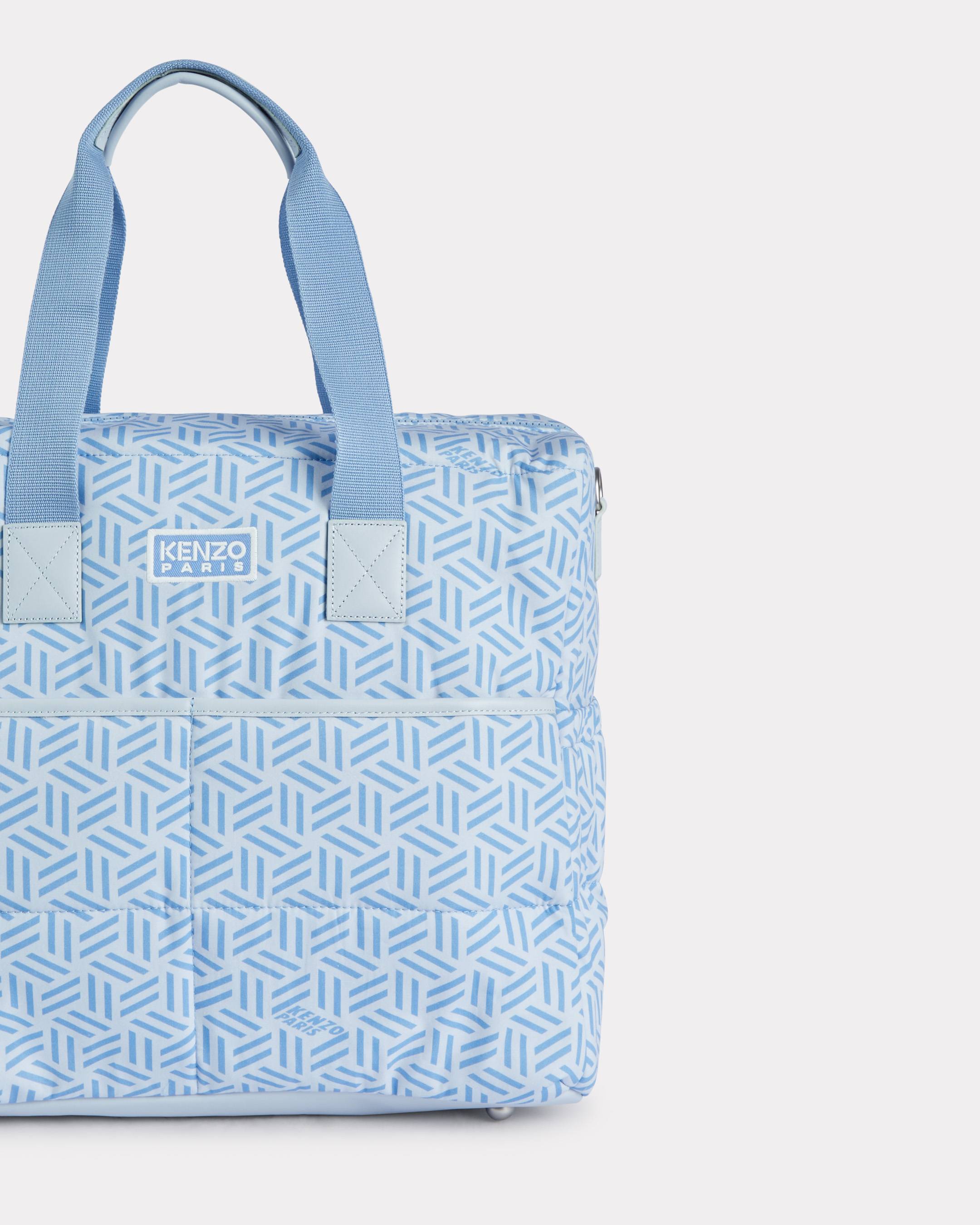 Quilted changing bag in poplin and leather