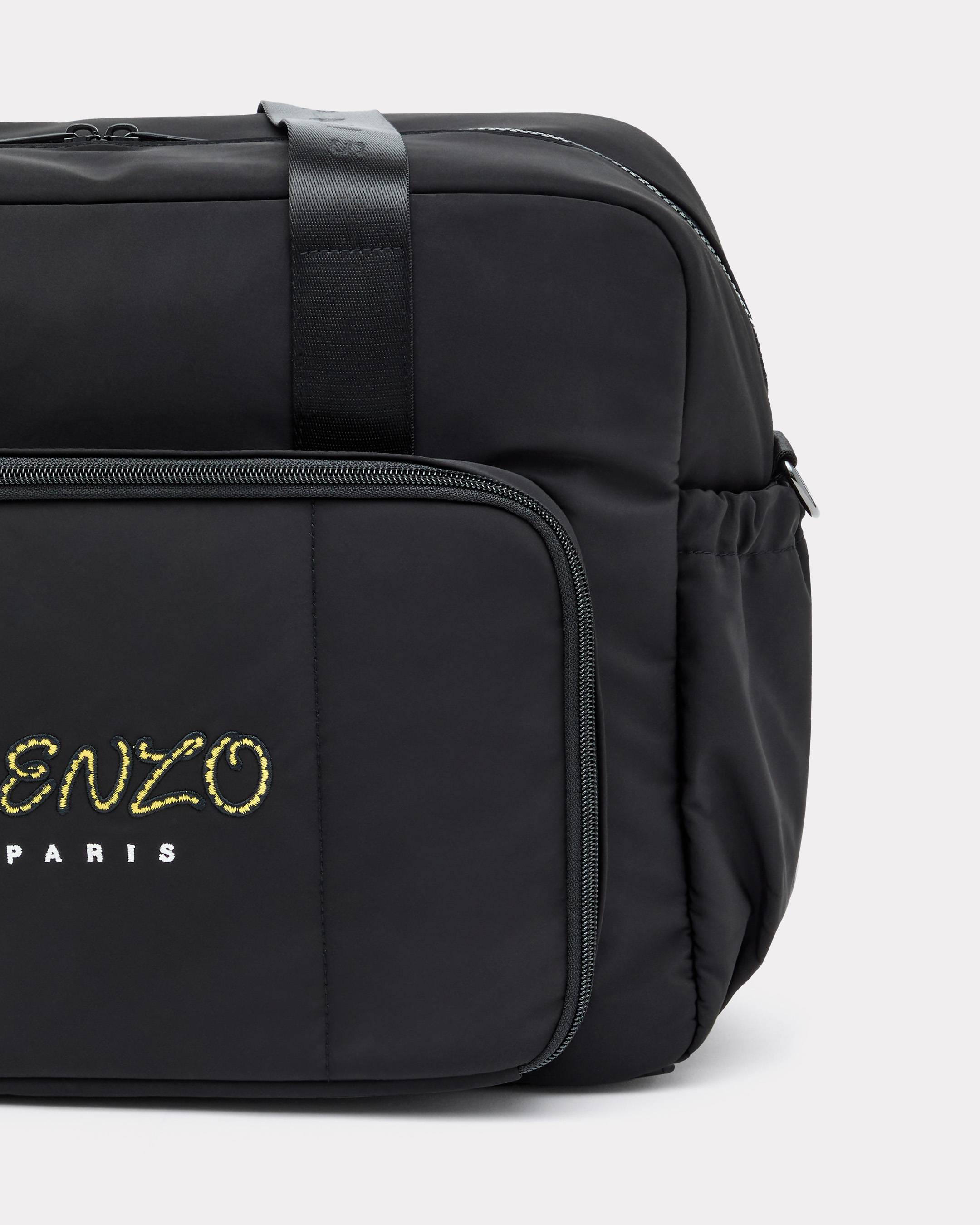 Water-repellent changing bag