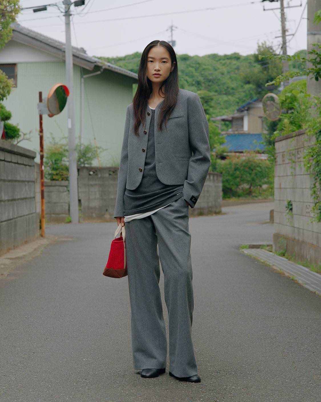 Fitted collarless jacket in mixed wool